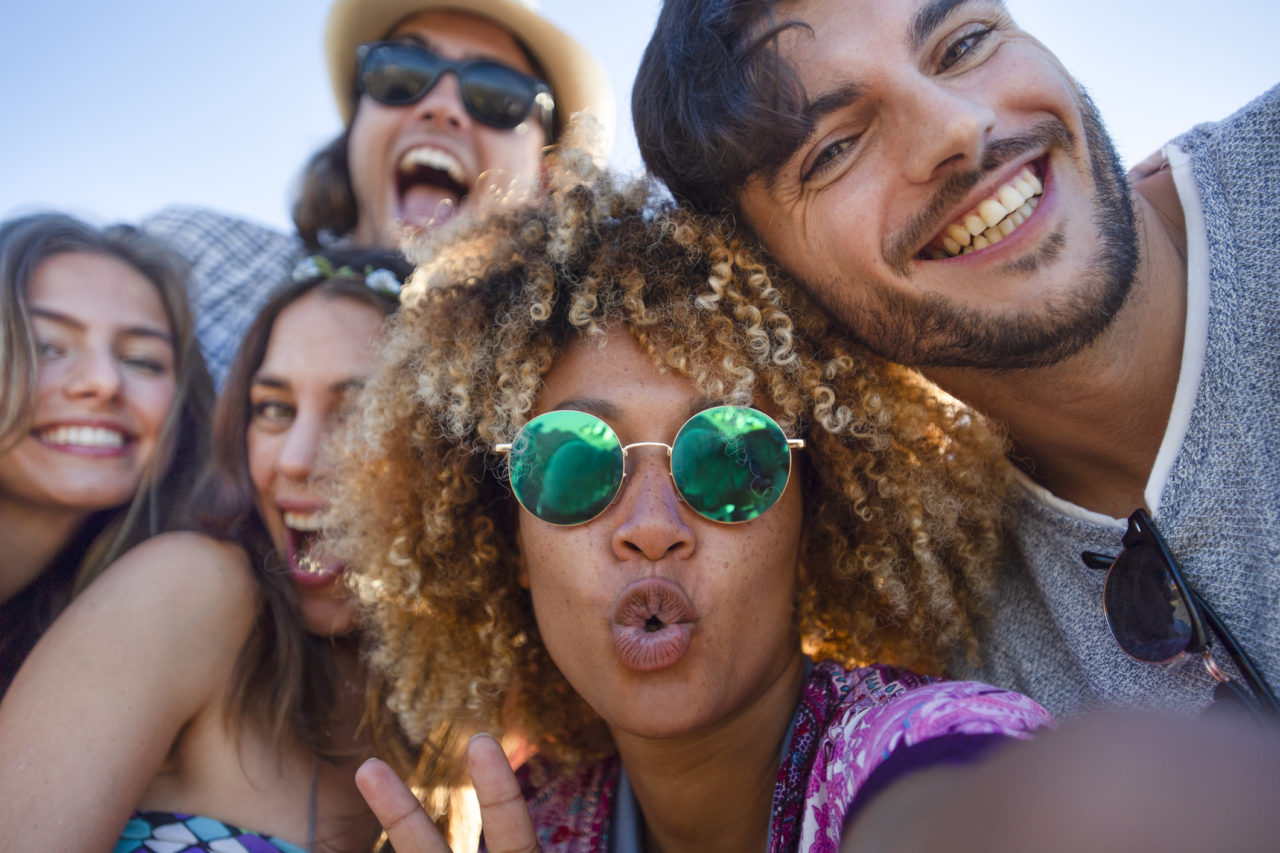 Group of people taking a selfie